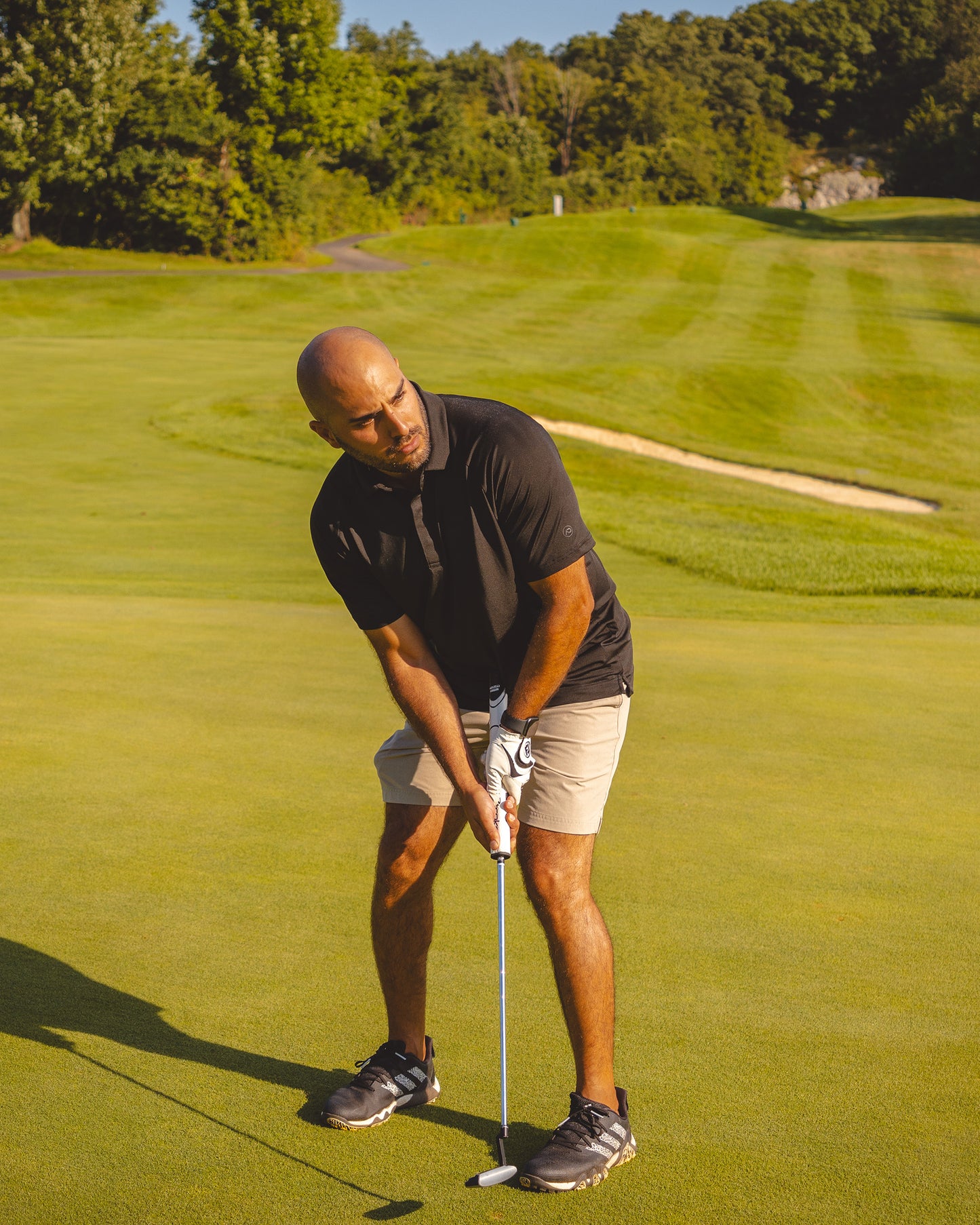 Man playing on golf course