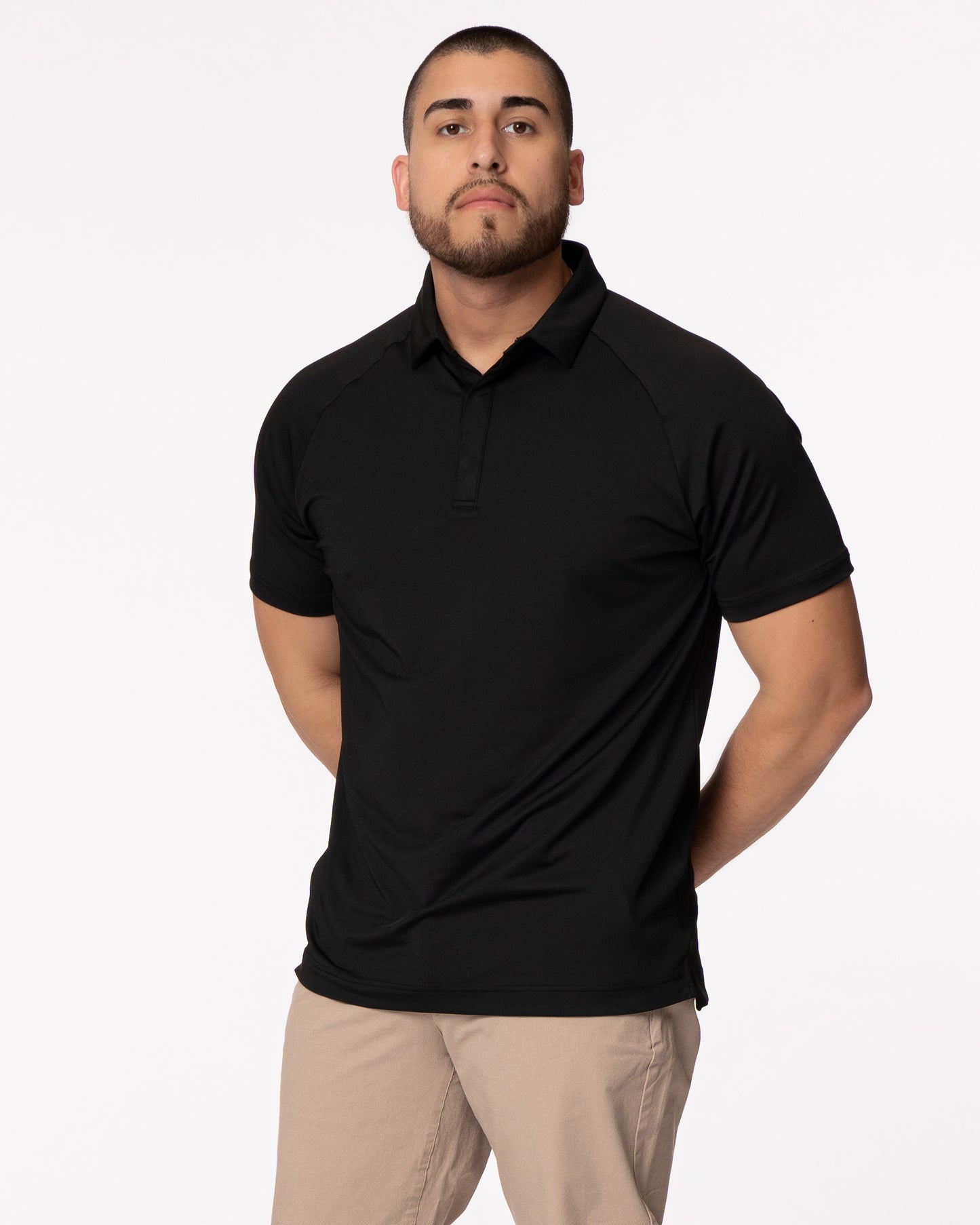Man in a black golf polo