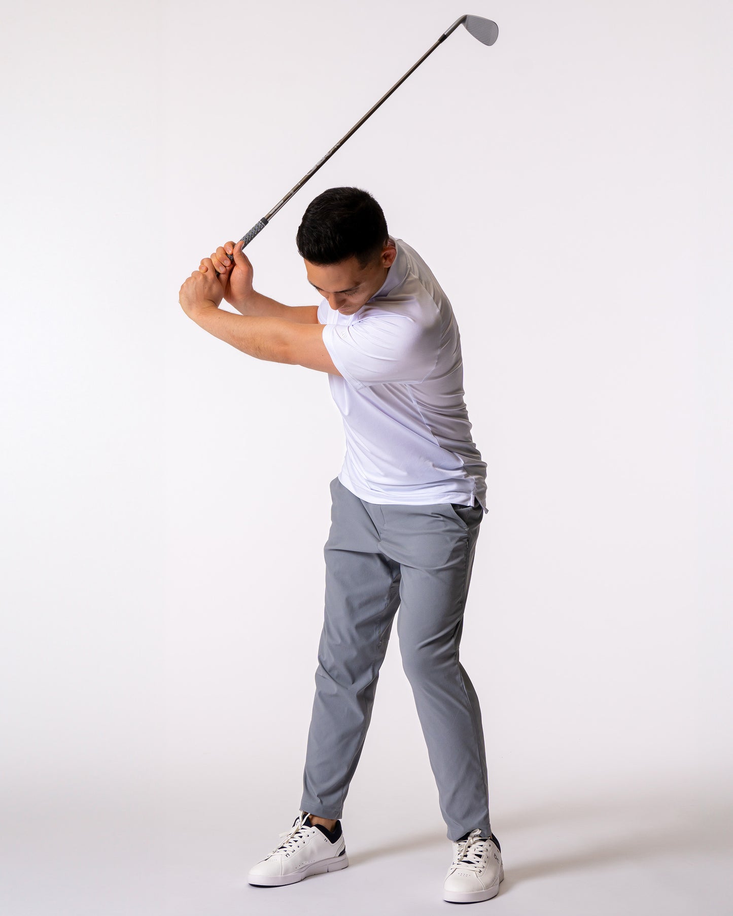 Man swinging golf club